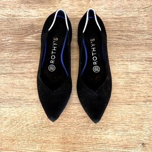 Retired Black pointed toe Rothy’s with white trim